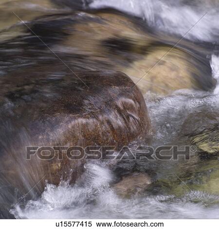 Stock Photography - Waterfall over rocks. Fotosearch