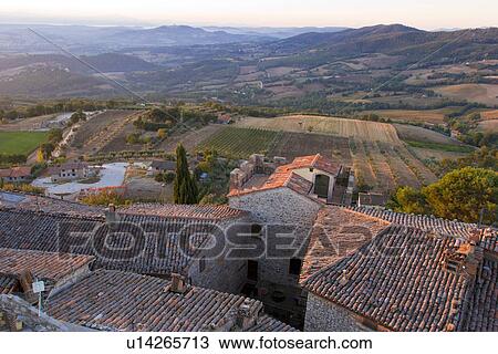 Stock Image - Aerial landscape view of Montecastello di Vibio, showing valley, roof tops, . Fotosearch