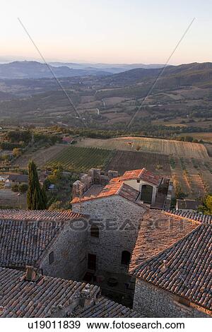 Stock Photo - Aerial landscape view of Montecastello di Vibio, showing valley, roof tops, . Fotosearch