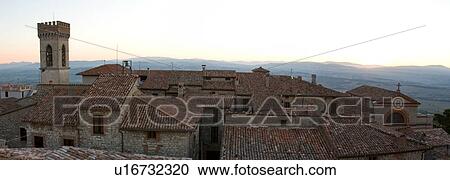 Aerial panorama view of Montecastello di Vibio, showing campanile and church of San Giacomo e Filippo, valley, roof tops, at sunrise with hills beyond View Large Photo Image Stock Image - Aerial panorama view of Montecastello di Vibio, showing campanile and church of San Giacomo e Filippo, valley, roof tops, at sunrise with hills beyond. Fotosearch