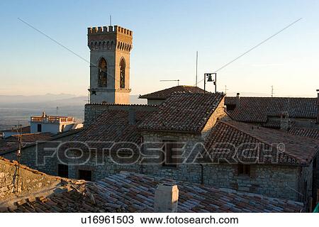 Stock Image - Aerial view of Montecastello di Vibio, showing valley, roof tops, campanile,. Fotosearch