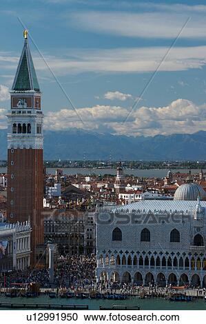 Stock Image - Aerial view of San Marco Campanile, Doge's Palace, waterfront, San Marco Basin from San Giorgio Maggiore. Fotosearch