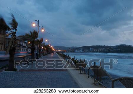 Stock Photo - Agropoli, Campania, Southern Italy, sea front at dusk in storm. Fotosearch