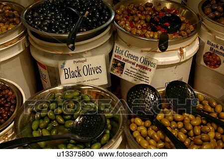 Stock Image - Assorted Olives in Delicatessen, close up. Fotosearch