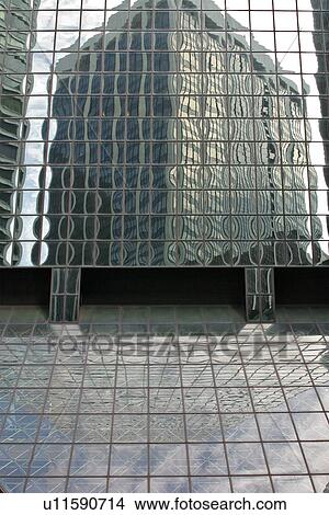 Picture - Atrium South Street, glass facade of skyscraper with reflection of other buildings. Fotosearch