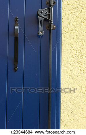 Picture - Burano brightly painted walls and door. Fotosearch