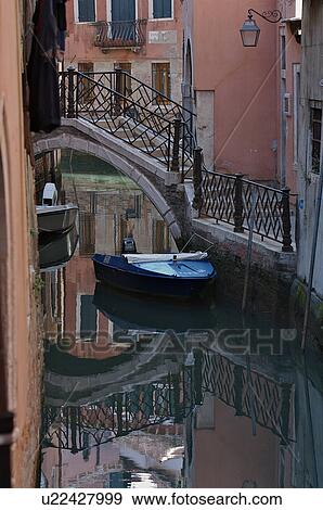 Stock Photo - canal with reflection of buildings. Fotosearch