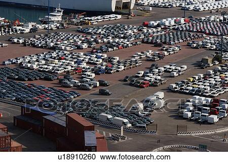 Cars and vans awaiting shipment on quayside View Large Photo Image Stock Image - Cars and vans awaiting shipment on quayside. Fotosearch