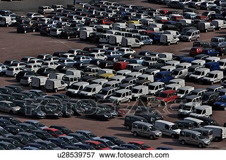 Cars and vans awaiting shipment on quayside View Large Photo Image Stock Photo - Cars and vans awaiting shipment on quayside. Fotosearch