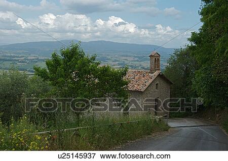 Church of Madonna delle Carceri, Monte Castello di Vibio, with landscape view of Tiber valley in background View Large Photo Image Stock Photo - Church of Madonna delle Carceri, Monte Castello di Vibio, with landscape view of Tiber valley in background. Fotosearch