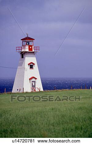 Cliff Lighthouse against sky, with sea beyond View Large Photo Image Stock Image - Cliff Lighthouse against sky, with sea beyond. Fotosearch