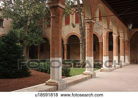 Cloister courtyard of Renaissance palace, Ferrara, with central landscaped garden and evergreen tree View Large Photo Image Stock Photo - Cloister courtyard of Renaissance palace, Ferrara, with central landscaped garden and evergreen tree. Fotosearch