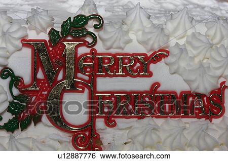 Closeup of Christmas cake decorated with white Royal icing, snow and icicles, Merry Christmas ornament red, gold and green View Large Photo Image Stock Photograph - Closeup of Christmas cake decorated with white Royal icing, snow and icicles, Merry Christmas ornament red, gold and green. Fotosearch