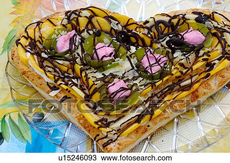 Closeup of heart-shaped mille-feuille pastry with pink and green decoration, chocolate drizzled swirls View Large Photo Image Stock Image - Closeup of heart-shaped mille-feuille pastry with pink and green decoration, chocolate drizzled swirls. Fotosearch