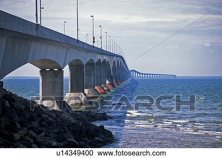 Stock Image - Confederation Bridge, view across sea, from Prince Edward Island, Canada. Fotosearch