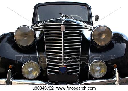Stock Image - Cut out front view of black Fiat showing hood, headlamps, and grille. Fotosearch