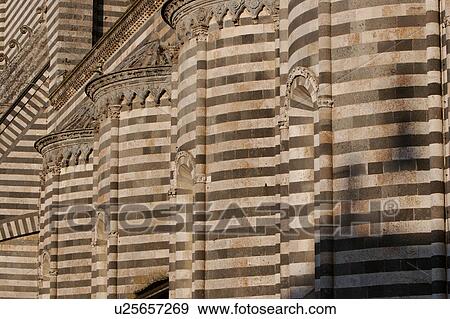 detail of ornate black and white columns and decorations of side wall of Orvieto Duomo, Umbria, Italy View Large Photo Image Stock Photo - detail of ornate black and white columns and decorations of side wall of Orvieto Duomo, Umbria, Italy. Fotosearch