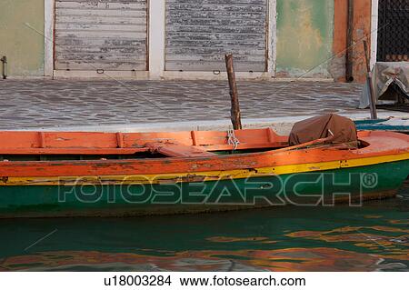 detail of painted rowing boat moored in Burano canal View Large Photo Image Picture - detail of painted rowing boat moored in Burano canal. Fotosearch