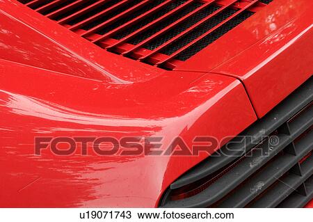 Detail of parked red Ferrari, rear and side view View Large Photo Image Stock Image - Detail of parked red Ferrari, rear and side view. Fotosearch