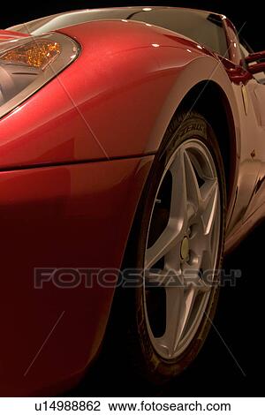 Detail of red Ferrari, side rear view, showing tyre and tail View Large Photo Image Stock Image - Detail of red Ferrari, side rear view, showing tyre and tail. Fotosearch