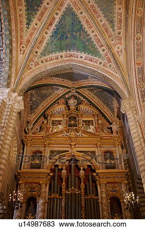 Detail of side of apse showing ornately painted organ, frescoes, and barrel vaulted ceiling View Large Photo Image Stock Image - Detail of side of apse showing ornately painted organ, frescoes, and barrel vaulted ceiling. Fotosearch