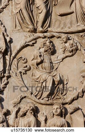 detail of stone sculptured bas-relief stone sculptured plaques on exterior facade of Orvieto Duomo, Umbria, Italy View Large Photo Image Stock Image - detail of stone sculptured bas-relief stone sculptured plaques on exterior facade of Orvieto Duomo, Umbria, Italy. Fotosearch