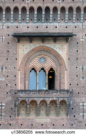 Stock Photography - Detail of triple arched courtyard window, Castello Sforzesca, Milan, Italy. Fotosearch
