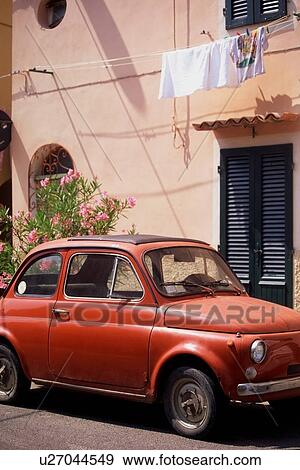 Fiat Cinquecento, parked in street, Elba, Italy View Large Photo Image Stock Photo - Fiat Cinquecento, parked in street, Elba, Italy. Fotosearch