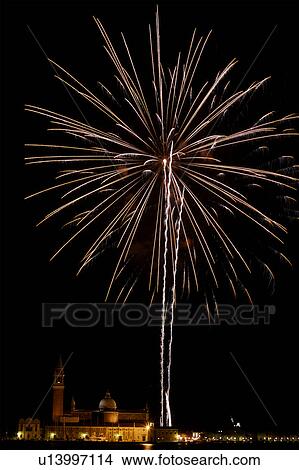 Fireworks exploding in the black night sky, Venice, Italy View Large Photo Image Picture - Fireworks exploding in the black night sky, Venice, Italy. Fotosearch