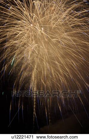 Fireworks exploding in the black night sky View Large Photo Image Stock Image - Fireworks exploding in the black night sky. Fotosearch