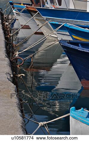 Picture - Fishing boats in Scario harbour, Campania, South Italy. Fotosearch