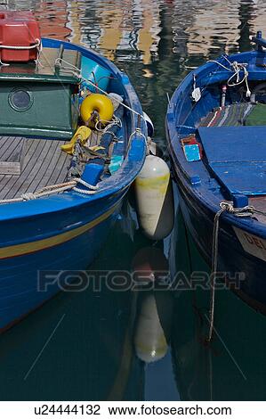 Stock Image - Fishing boats in Scario harbour, Campania, South Italy. Fotosearch