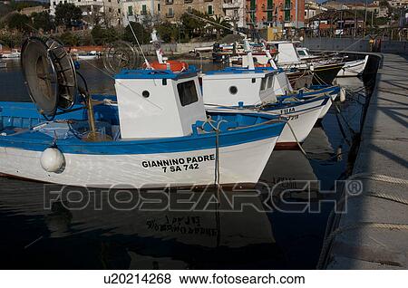 Fishing boats moored in harbour View Large Photo Image Stock Photo - Fishing boats moored in harbour. Fotosearch