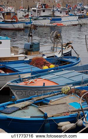 Stock Photograph - Fishing boats moored in San Marco harbour, . Fotosearch