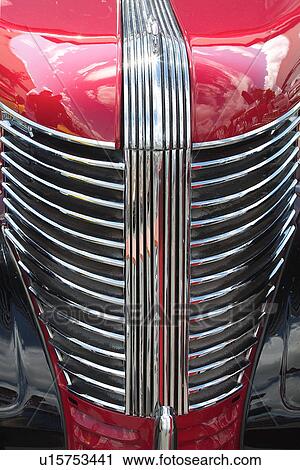 Front view detail of antique red car with silver grille detail View Large Photo Image Stock Image - Front view detail of antique red car with silver grille detail. Fotosearch