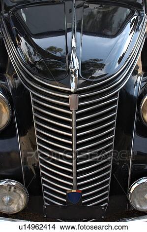 Front view detail of black Fiat showing hood, headlamps, and grille View Large Photo Image Picture - Front view detail of black Fiat showing hood, headlamps, and grille. Fotosearch