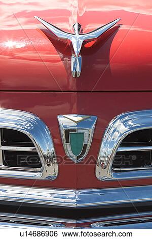 front view of old red Chrysler, detail of front hood and grille, with silver chrome trim, logo removed View Large Photo Image Stock Photograph - front view of old red Chrysler, detail of front hood and grille, with silver chrome trim, logo removed. Fotosearch