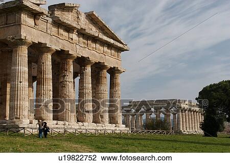 Greek Temples in Campania, Italy: Foreground - Temple of Neptune (Poseidon) aka Temple of Hera II, Background - Basilica aka Temple of Hera I, front facade View Large Photo Image Stock Image - Greek Temples in Campania, Italy: Foreground - Temple of Neptune (Poseidon) aka Temple of Hera II, Background - Basilica aka Temple of Hera I, front facade. Fotosearch