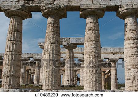 Greek Temples in Campania, Italy: foreground - Basilica aka Temple of Hera I, Background - Temple of Neptune (Poseidon) aka Temple of Hera II, detail view View Large Photo Image Stock Photo - Greek Temples in Campania, Italy: foreground - Basilica aka Temple of Hera I, Background - Temple of Neptune (Poseidon) aka Temple of Hera II, detail view. Fotosearch