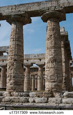 Greek Temples in Campania, Italy: Foreground - Basilica aka Temple of Hera I, Background - Temple of Neptune (Poseidon) aka Temple of Hera II, detail view View Large Photo Image Stock Photo - Greek Temples in Campania, Italy: Foreground - Basilica aka Temple of Hera I, Background - Temple of Neptune (Poseidon) aka Temple of Hera II, detail view. Fotosearch