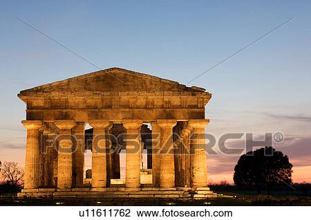 Greek temples: Temple of Neptune (Poseidon) aka Temple of Hera II, front facade at sunset View Large Photo Image Stock Image - Greek temples: Temple of Neptune (Poseidon) aka Temple of Hera II, front facade at sunset. Fotosearch