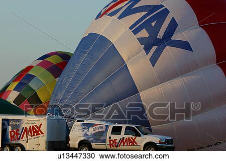 Hot air balloons on ground View Large Photo Image Stock Image - Hot air balloons on ground. Fotosearch