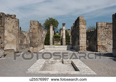 House of Pansa, atrium with impluvium in foreground and columns of peristyle behind View Large Photo Image Stock Photo - House of Pansa, atrium with impluvium in foreground and columns of peristyle behind. Fotosearch