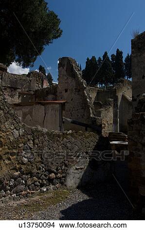 Picture - In the shadow of Vesuvius, the ruins of Ercolano - tavern. Fotosearch