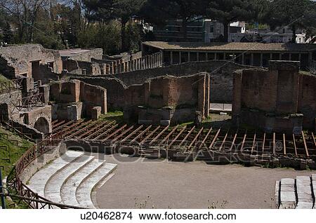 In the shadow of Vesuvius, the ruins of Pompei - Great Theatre and quadriporticus View Large Photo Image Picture - In the shadow of Vesuvius, the ruins of Pompei - Great Theatre and quadriporticus. Fotosearch