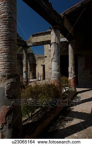 Picture - In the shadow of Vesuvius, the ruins of Ercolano - House of the Corinthian Atrium. Fotosearch