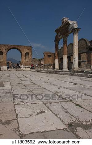 In the shadow of Vesuvius, the ruins of Pompei - Forum, with Vesuvius seen through Arch View Large Photo Image Stock Image - In the shadow of Vesuvius, the ruins of Pompei - Forum, with Vesuvius seen through Arch. Fotosearch