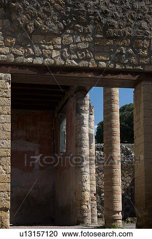 In the shadow of Vesuvius, the ruins of Ercolano - house of the wooden partition, view of peristyle View Large Photo Image Stock Image - In the shadow of Vesuvius, the ruins of Ercolano - house of the wooden partition, view of peristyle. Fotosearch