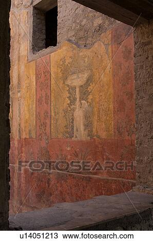 Stock Image - In the shadow of Vesuvius, the ruins of the Imperial Villa of Oplontis - detail of frescoes in guest rooms with architectural detail of window frame. Fotosearch