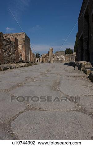 In the shadow of Vesuvius, the ruins of Pompei - Via Consolare and buildings View Large Photo Image Stock Image - In the shadow of Vesuvius, the ruins of Pompei - Via Consolare and buildings. Fotosearch